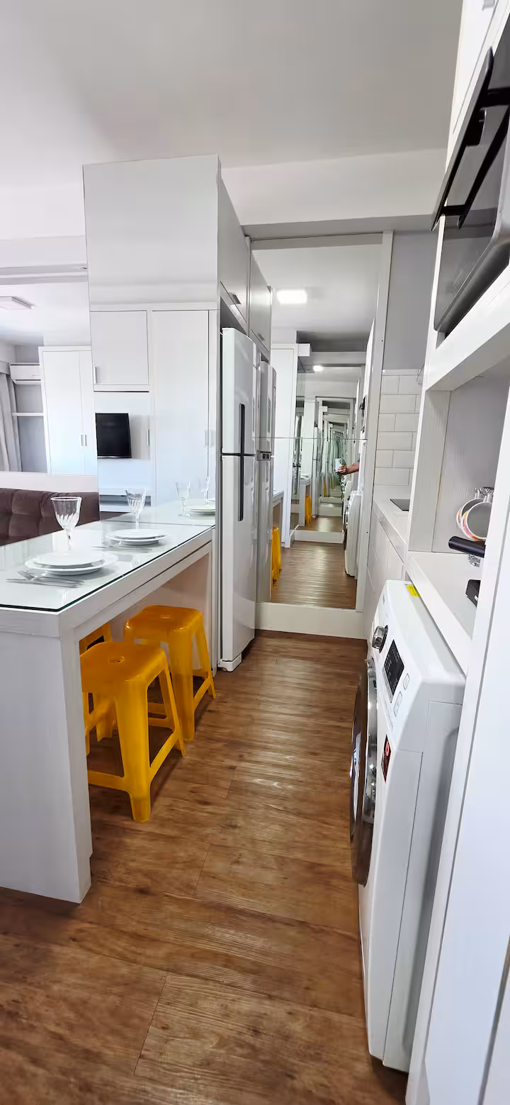 Cozinha integrada com lava e seca